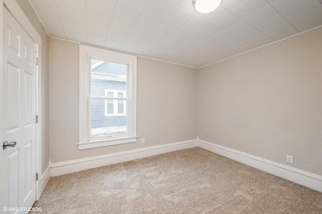 empty room featuring carpet flooring