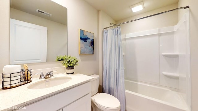 full bathroom featuring vanity, toilet, and shower / bath combo with shower curtain