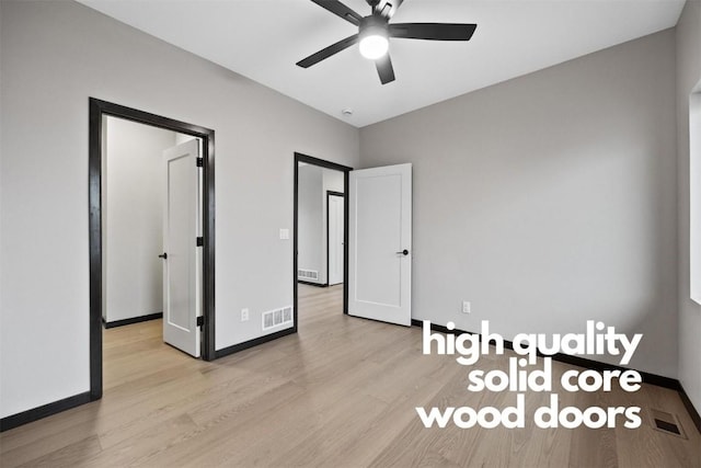 unfurnished bedroom with ceiling fan and light wood-type flooring