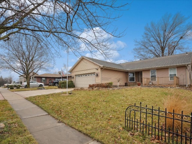 single story home featuring a garage and a front lawn