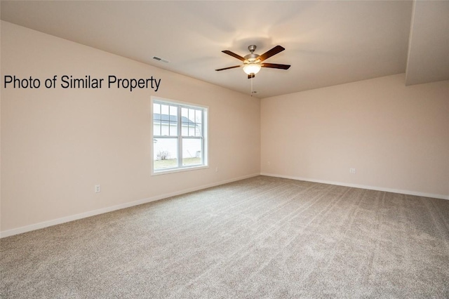 carpeted empty room with ceiling fan