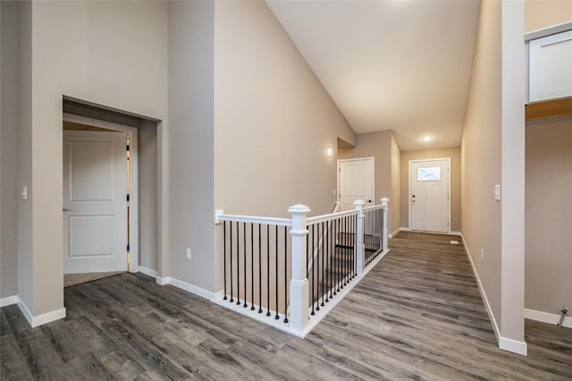 hallway featuring dark hardwood / wood-style flooring