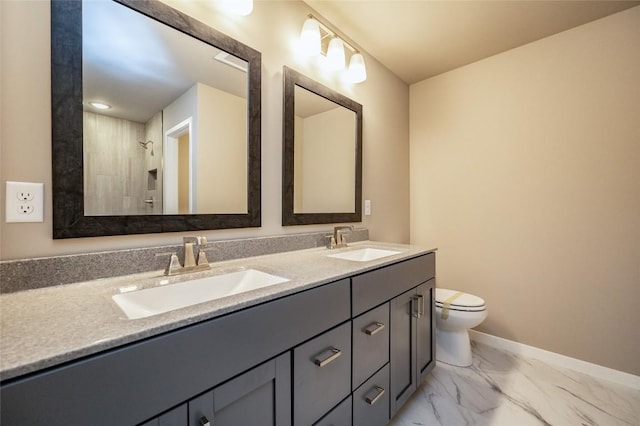 bathroom featuring walk in shower, vanity, and toilet