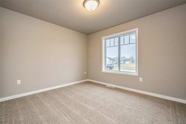 view of carpeted spare room