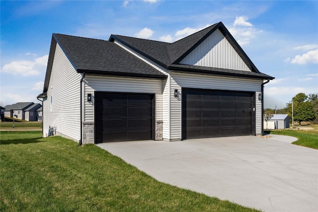 view of home's exterior featuring a garage and a yard