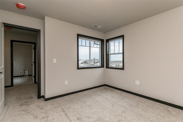 unfurnished bedroom with light carpet