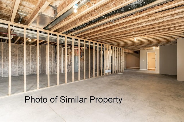 basement featuring water heater