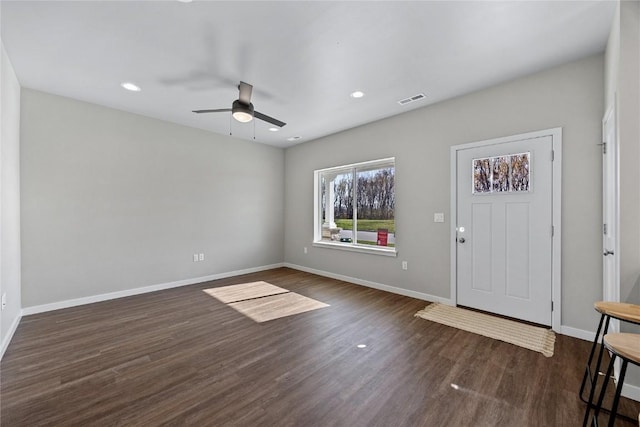 entrance foyer featuring ceiling fan and dark hardwood / wood-style flooring