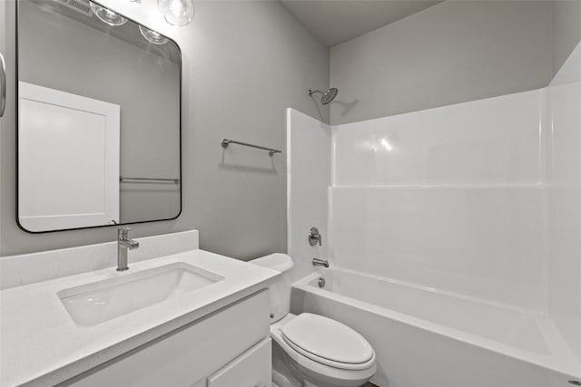 full bathroom with shower / washtub combination, vanity, and toilet