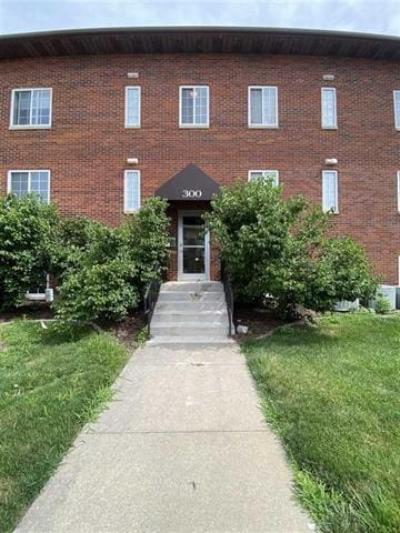 exterior space featuring a front lawn