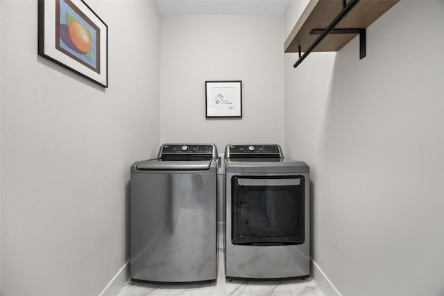 laundry area featuring washing machine and dryer