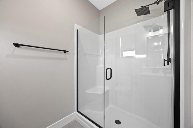 bathroom featuring an enclosed shower