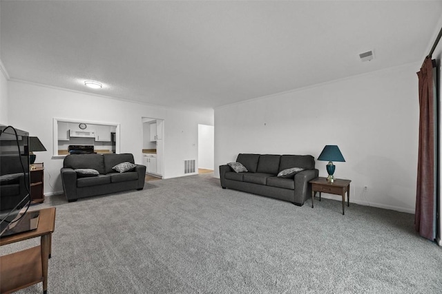 living room featuring carpet and crown molding