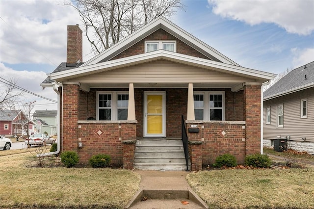 bungalow with a front yard