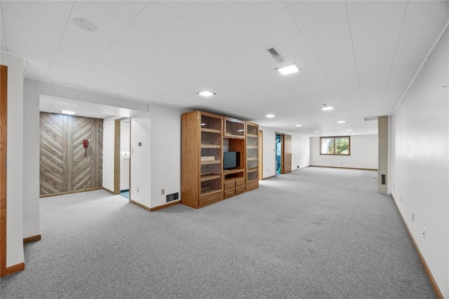 basement featuring carpet floors