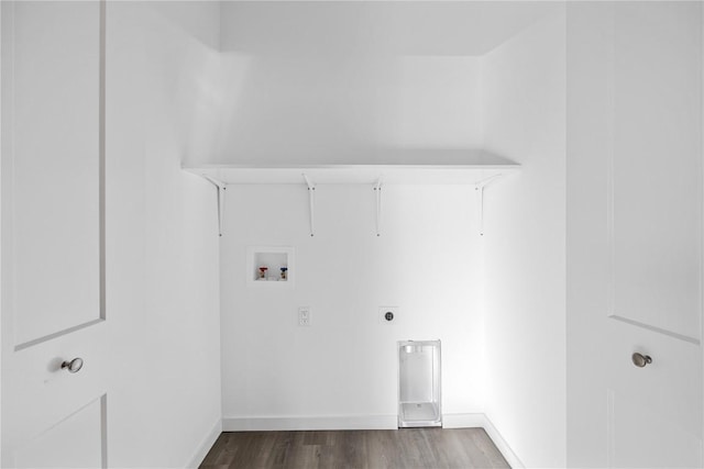 clothes washing area featuring electric dryer hookup, dark hardwood / wood-style flooring, and hookup for a washing machine