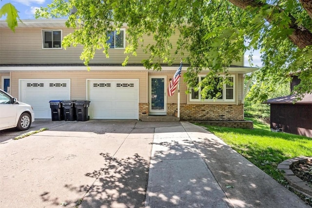 view of front of property featuring a garage