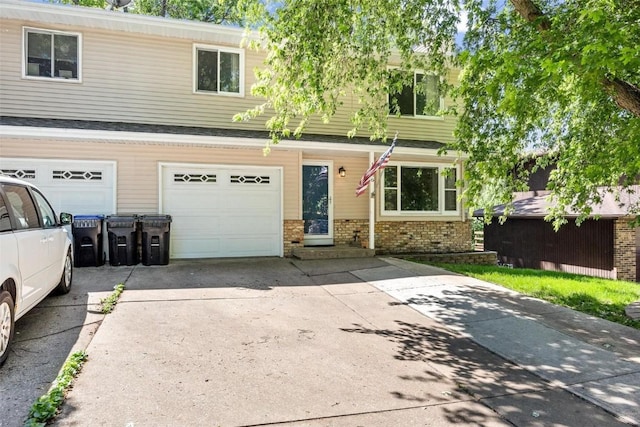 view of front of property featuring a garage