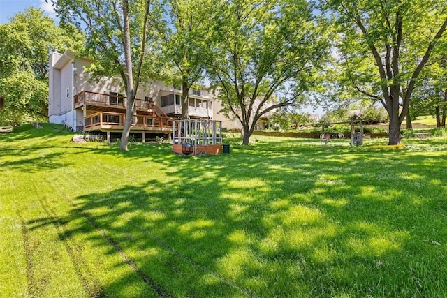 view of yard with a deck