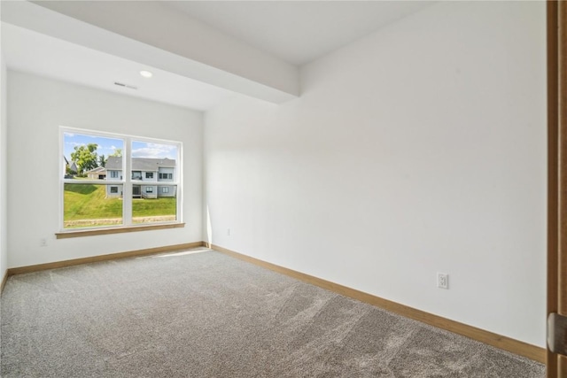 view of carpeted spare room