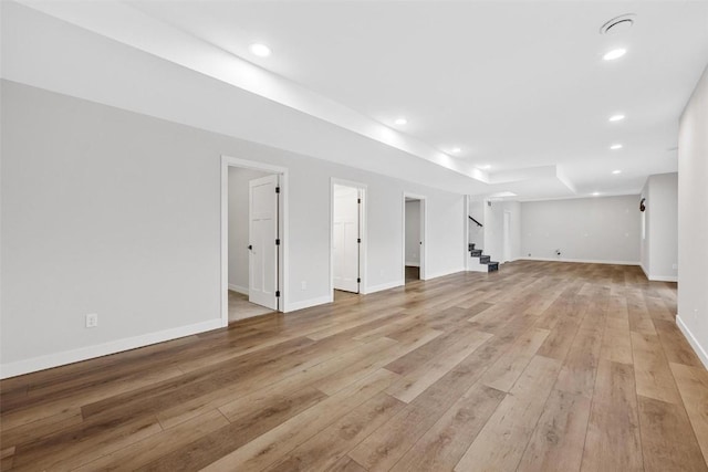 basement featuring light hardwood / wood-style flooring