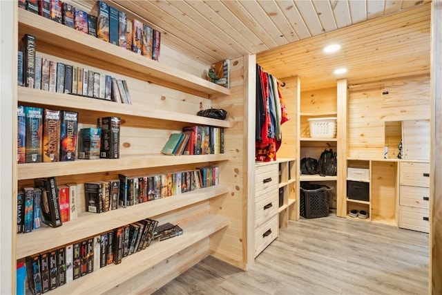 walk in closet featuring hardwood / wood-style flooring