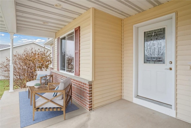 entrance to property with covered porch