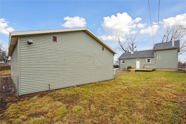 view of home's exterior featuring a yard