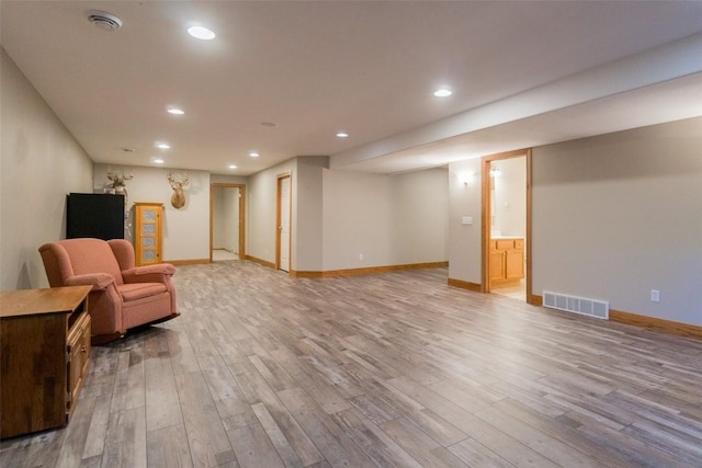 living area featuring light hardwood / wood-style floors