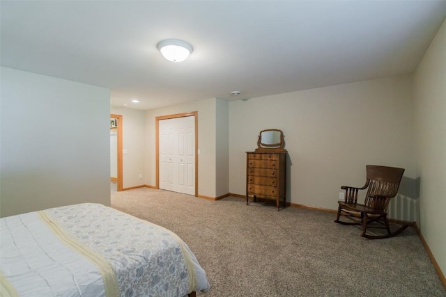 carpeted bedroom with a closet