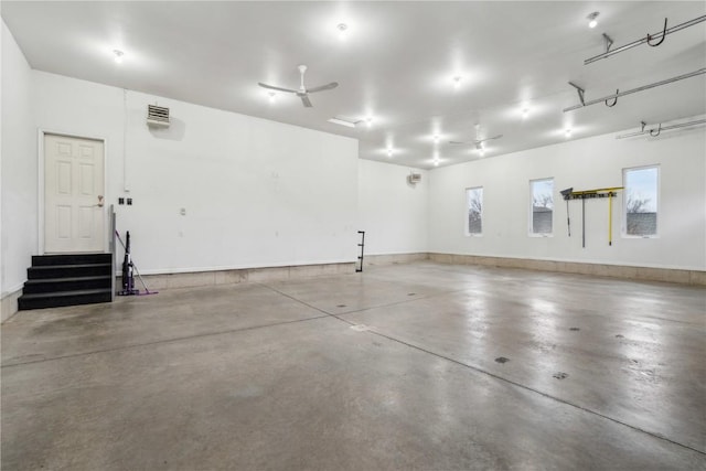 garage with a ceiling fan