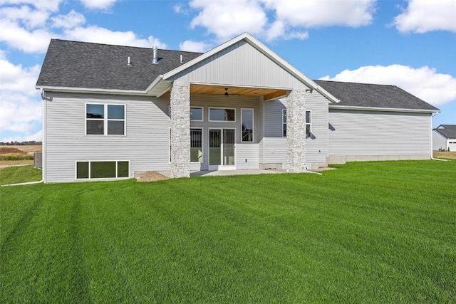 back of house with a lawn, ceiling fan, and a patio