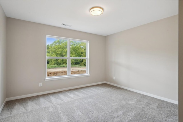 unfurnished room with carpet