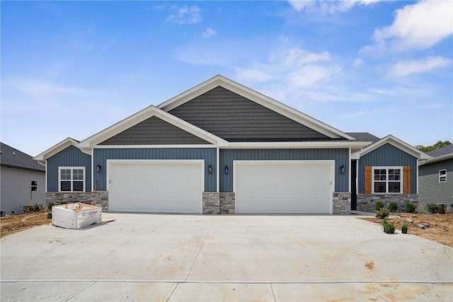 craftsman inspired home with a garage