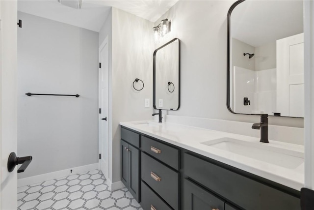 bathroom with vanity and walk in shower