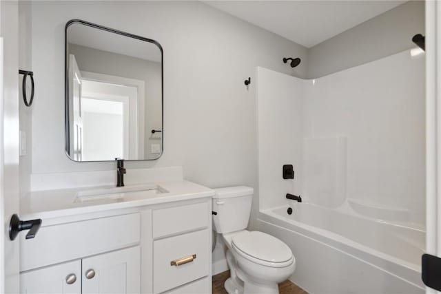 full bathroom with vanity, toilet, and shower / washtub combination