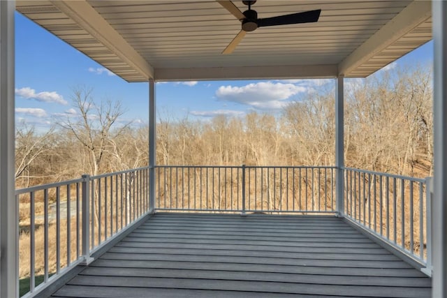 wooden deck with ceiling fan