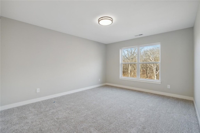 view of carpeted spare room