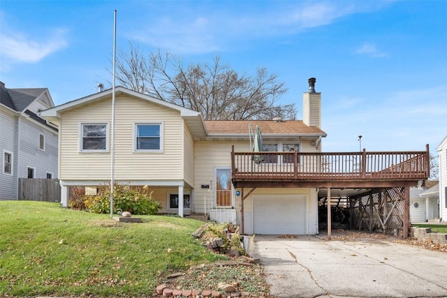 rear view of property featuring a yard, a garage, a deck, and a carport