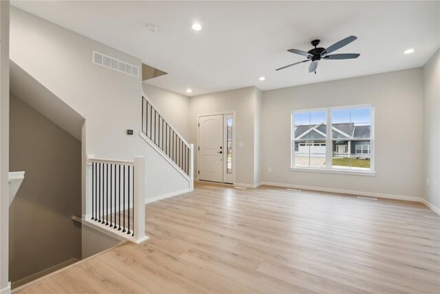 entrance foyer featuring ceiling fan and light hardwood / wood-style flooring