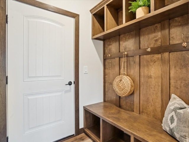 mudroom with light hardwood / wood-style flooring