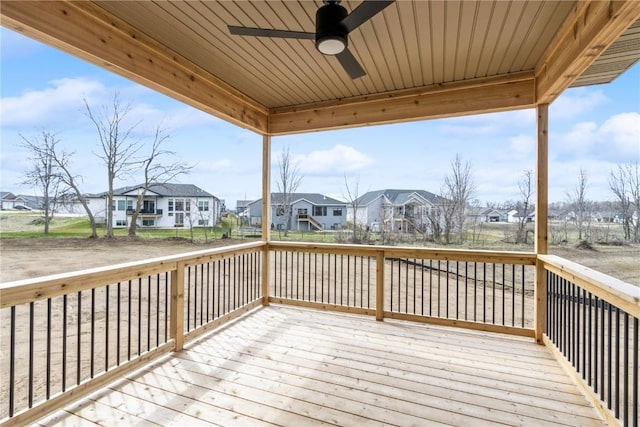 wooden deck with ceiling fan