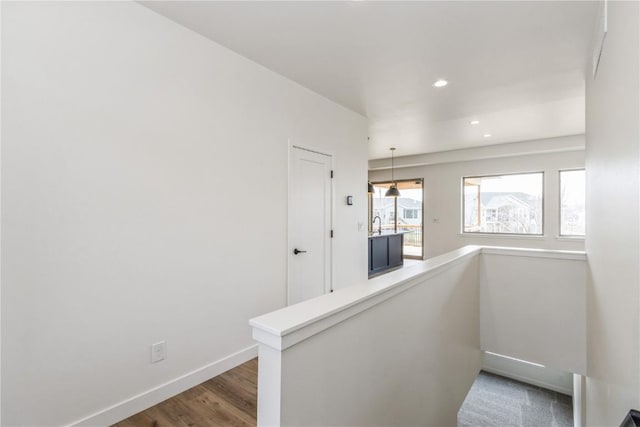 hallway featuring dark wood-type flooring