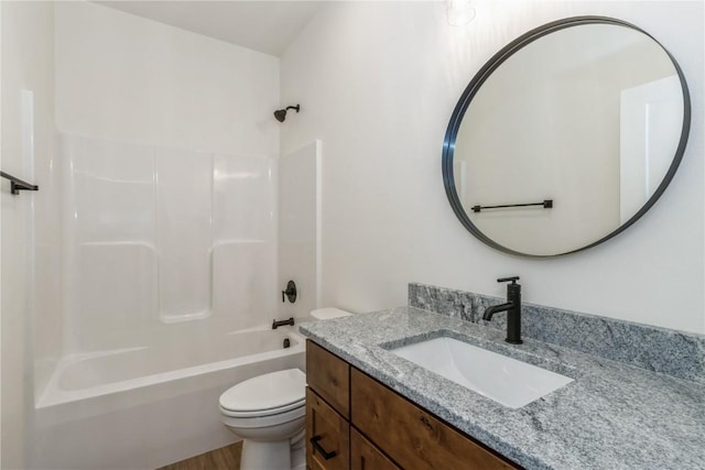 full bathroom featuring vanity, toilet, and shower / washtub combination