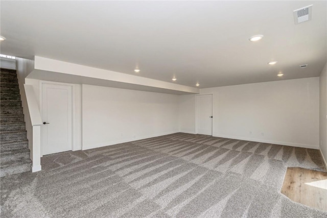 basement featuring carpet flooring