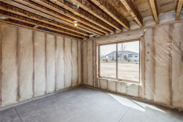 interior space featuring concrete flooring