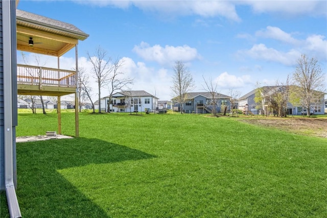 view of yard featuring a wooden deck