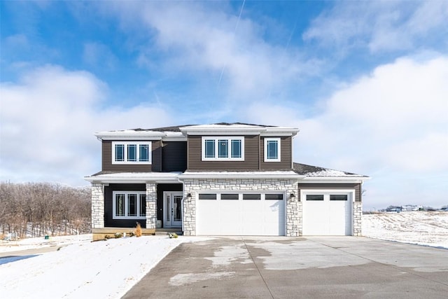 view of front of property with a garage