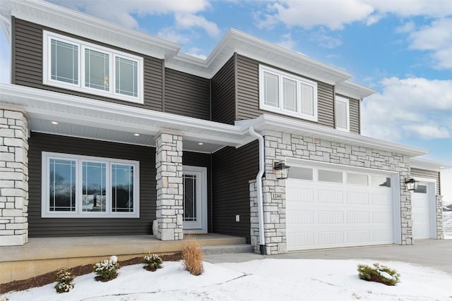 view of front of property with a garage