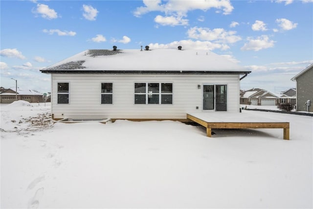 view of snow covered property